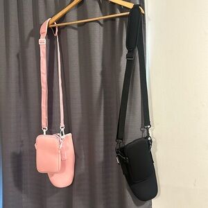 2 Tumbler carriers- black and pink
